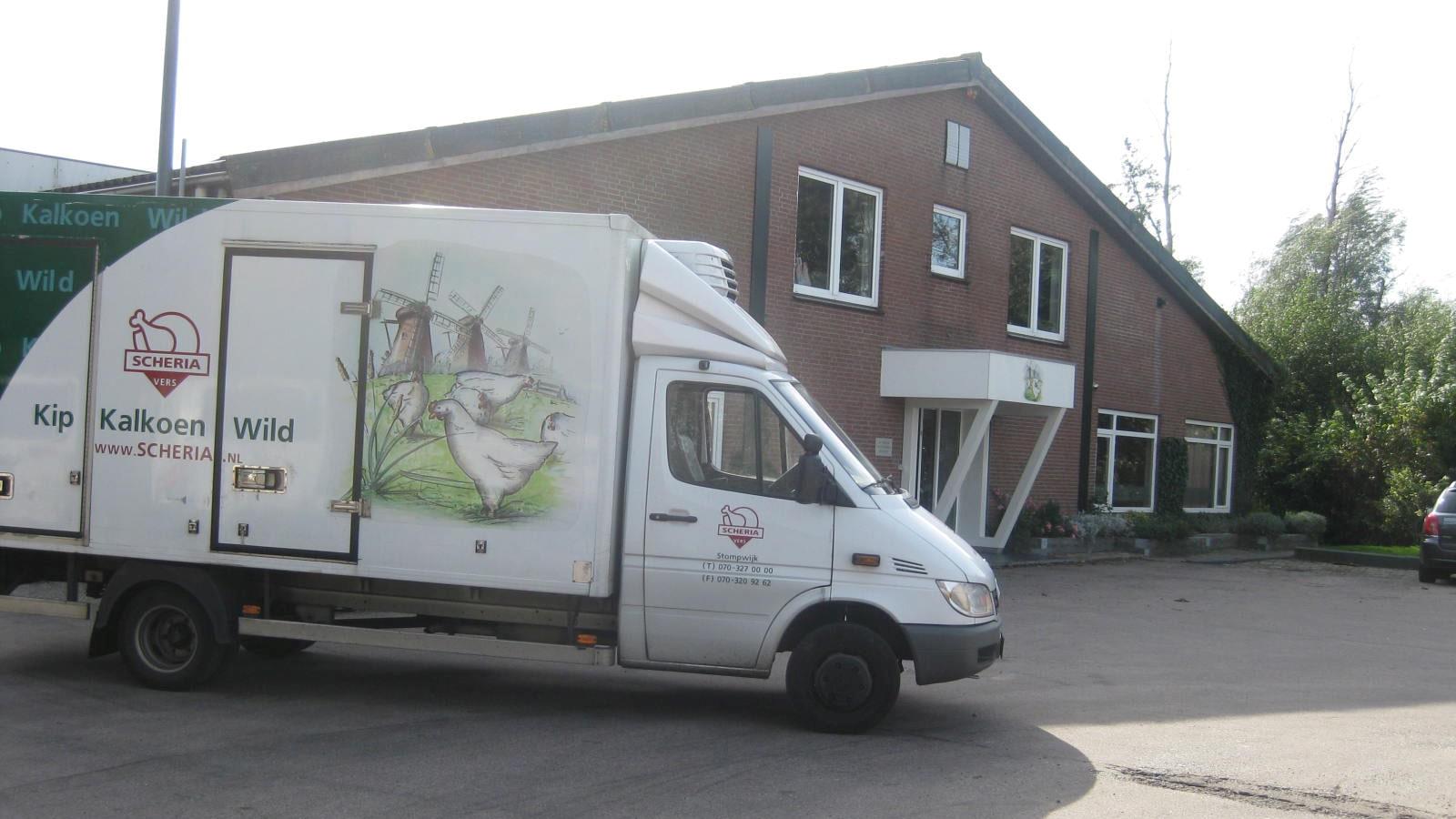 Van with chicken graphics standing outside Dutch company Scheria Versdienst
